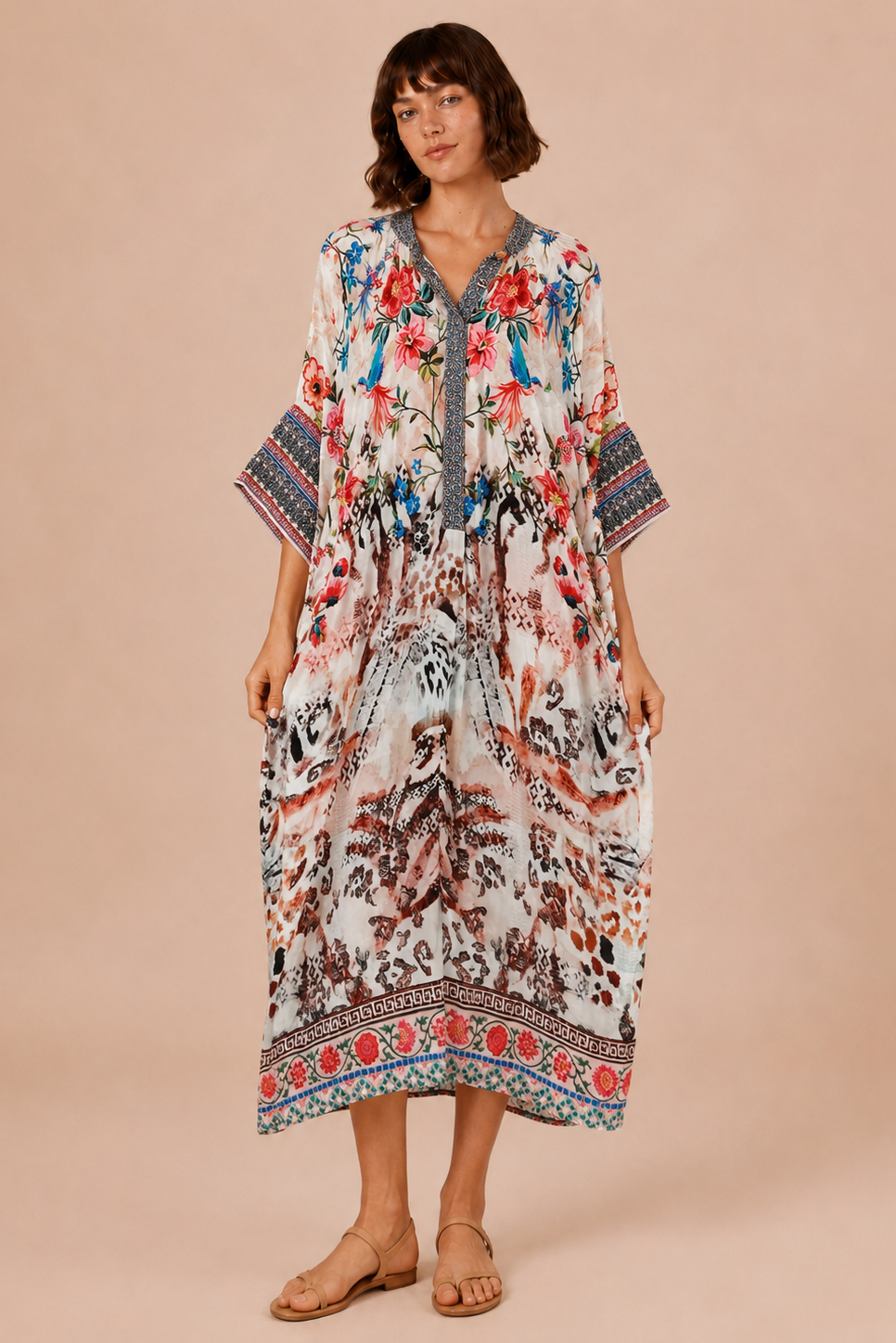 Botanical Garden Kaftan Dress - front view showing V-neckline with embroidered trim and vibrant mixed print