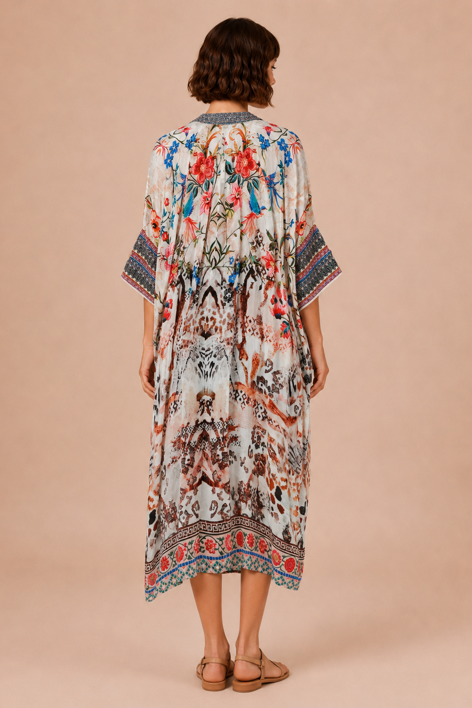 Botanical Garden Kaftan Dress - side profile view showing relaxed silhouette and ornate border hem
