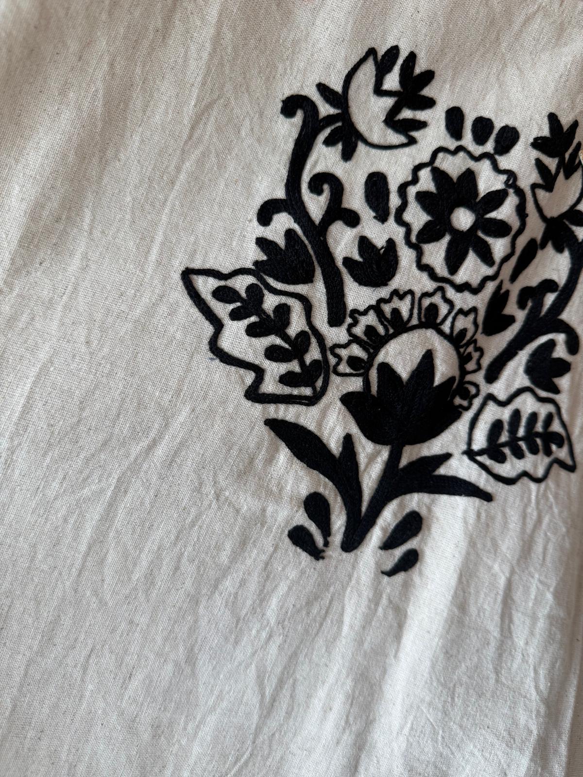 Embroidered Linen Sleeveless Top – black floral embroidery close-up detail on natural linen – tosee-rang.com.au