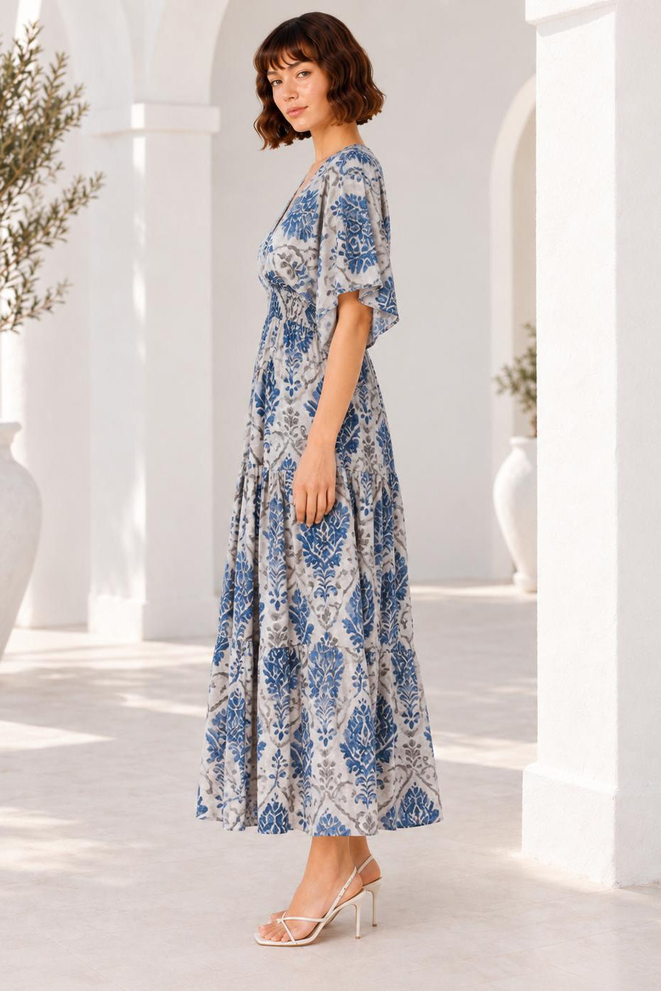 Mahi Dress blue botanical print midi dress side view full length
